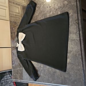 Toddler girl knee length black dress with Cream Bow detail, button up closure